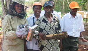 Bee keepers with smoker.
